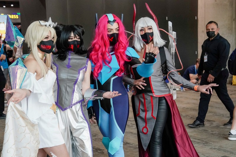 Performers cosplay as characters from the Netflix animated series Farzar to promote the show, outside Comic-Con International in San Diego, California, U.S., July 22, 2022. REUTERS/Bing Guan