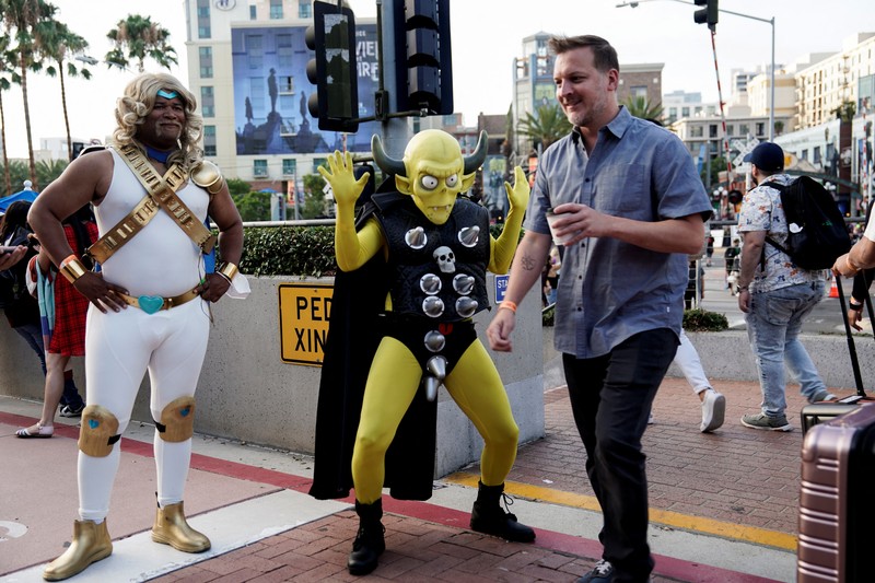 Performers cosplay as characters from the Netflix animated series Farzar to promote the show, outside Comic-Con International in San Diego, California, U.S., July 22, 2022. REUTERS/Bing Guan
