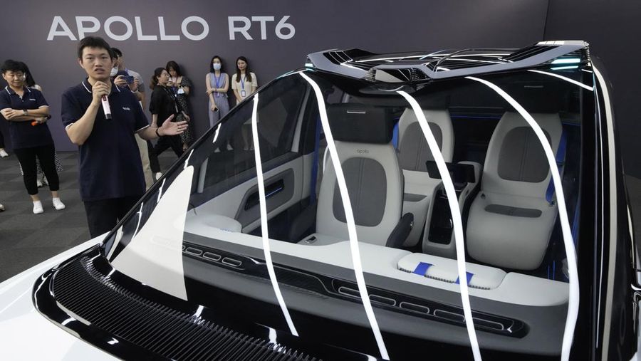 This picture taken on July 20, 2022 shows Baidu's Apollo RT6 next-generation autonomous vehicle during its unveiling in Beijing. - The Apollo RT6 is designed for fully autonomous driving with detachable steering wheel, and is set to join the Apollo Go ride-hailing service starting in 2023. (Photo by Noel Celis / AFP) (Photo by NOEL CELIS/AFP via Getty Images)