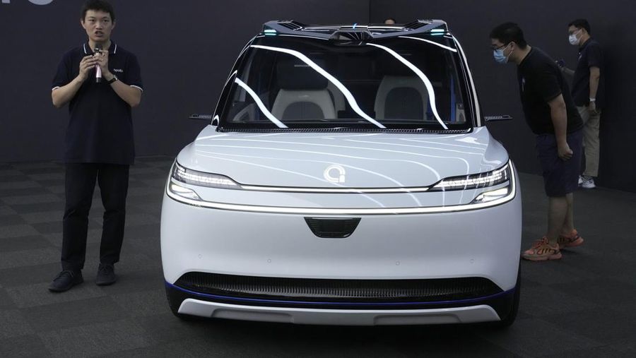 This picture taken on July 20, 2022 shows Baidu's Apollo RT6 next-generation autonomous vehicle during its unveiling in Beijing. - The Apollo RT6 is designed for fully autonomous driving with detachable steering wheel, and is set to join the Apollo Go ride-hailing service starting in 2023. (Photo by Noel Celis / AFP) (Photo by NOEL CELIS/AFP via Getty Images)