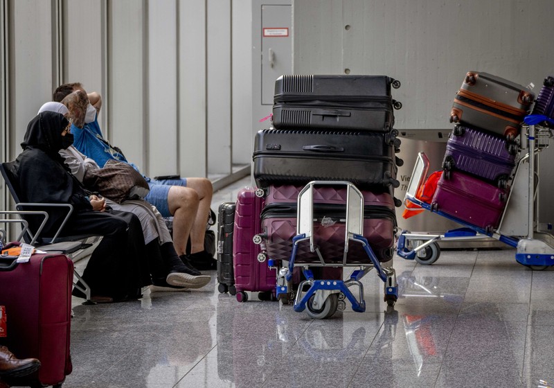 Penumpang pesawat Lufthansa di Jerman terbengkalai imbas staf dan karyawan mogok masal. (AP/Martin Meissner) Penumpang pesawat Lufthansa di Jerman terbengkalai imbas staf dan karyawan mogok masal. (AP/Martin Meissner)