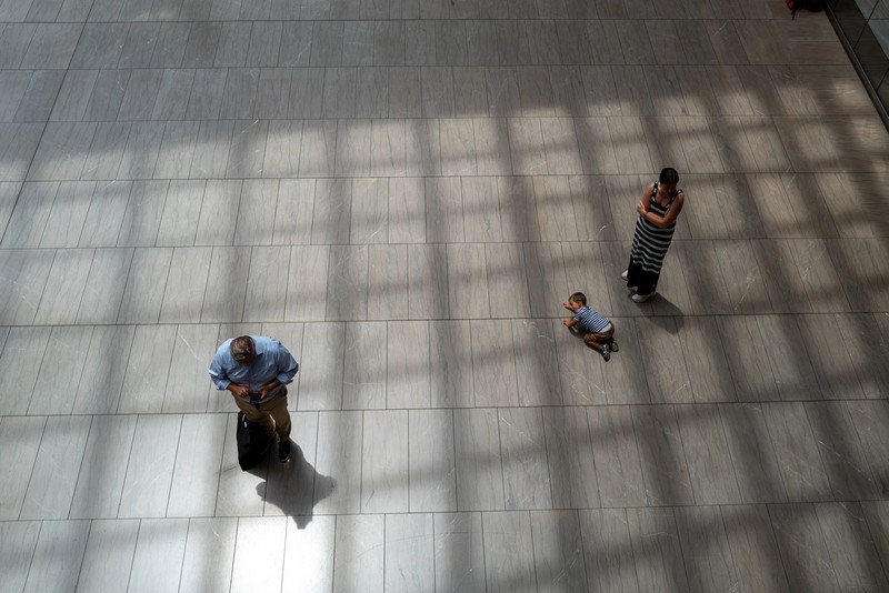 1242165534 NEW YORK, NEW YORK - JULY 28: Travelers move through the Moynihan Train Hall in Manhattan on July 28, 2022 in New York City. The Commerce Department said on Thursday that the nation's Gross Domestic Product (GDP) fell 0.2 percent in the second quarter. With two GDP declines in a row, many economists fear that the United States could be entering a recession. (Photo by Spencer Platt/Getty Images