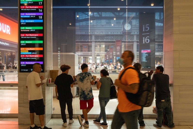 NEW YORK, NEW YORK - JULY 28: Travelers move through the Moynihan Train Hall in Manhattan on July 28, 2022 in New York City. The Commerce Department said on Thursday that the nation's Gross Domestic Product (GDP) fell 0.2 percent in the second quarter. With two GDP declines in a row, many economists fear that the United States could be entering a recession.  (Photo by Spencer Platt/Getty Images
