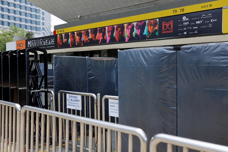 Hong Kong Concert Investigation In this image made from video taken from social media, a video screen suspended above the stage falls onto the stage where dancers perform at a concert of Cantopop boy band Mirror in Hong Kong, Thursday, July 28, 2022. Hong Kong officials say they will open an investigation into the concert accident in which the giant video screen fell down onto the stage and injured two dancers. (AP Photo)