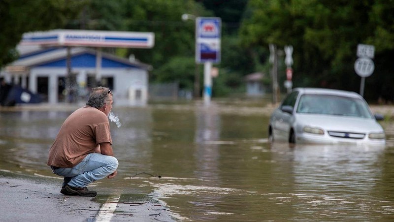 A flooded area is flown over by a Kentucky National Guard helicopter deployed in response to a declared state of emergency in eastern Kentucky, U.S. July 27, 2022. U.S. Army National Guard/Handout via REUTERS  THIS IMAGE HAS BEEN SUPPLIED BY A THIRD PARTY.