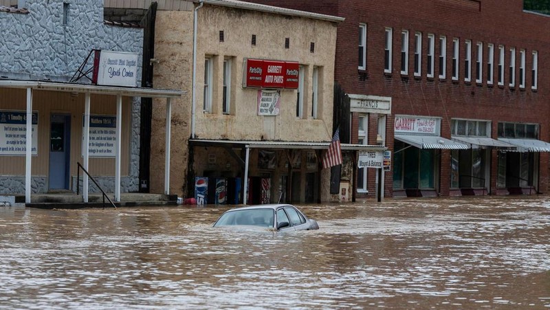 A flooded area is flown over by a Kentucky National Guard helicopter deployed in response to a declared state of emergency in eastern Kentucky, U.S. July 27, 2022. U.S. Army National Guard/Handout via REUTERS  THIS IMAGE HAS BEEN SUPPLIED BY A THIRD PARTY.