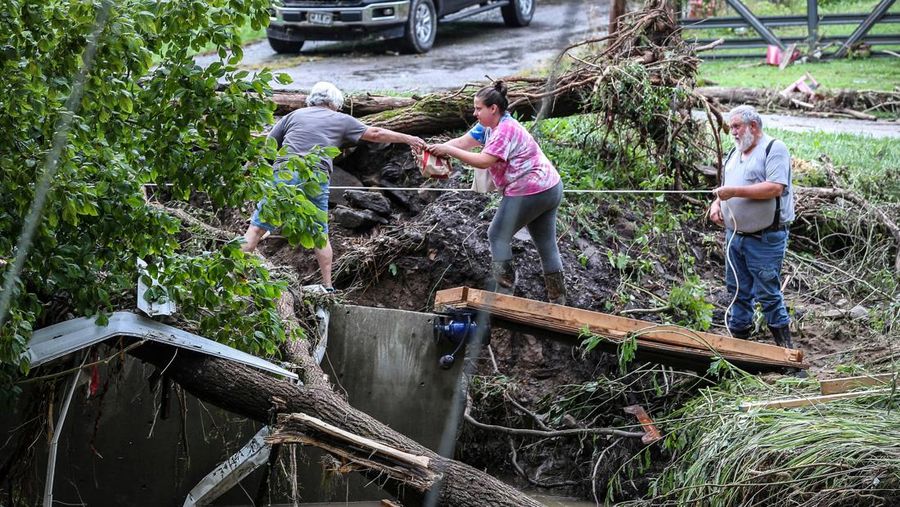 A flooded area is flown over by a Kentucky National Guard helicopter deployed in response to a declared state of emergency in eastern Kentucky, U.S. July 27, 2022. U.S. Army National Guard/Handout via REUTERS  THIS IMAGE HAS BEEN SUPPLIED BY A THIRD PARTY.
