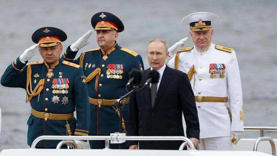 Russia's President Vladimir Putin, Defence Minister Sergei Shoigu and head of the Russian navy Admiral Nikolai Yevmenov attend a parade marking Navy Day in Saint Petersburg, Russia July 31, 2022. REUTERS/Maxim Shemetov