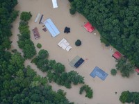 Potret Banjir Bandang Terjang AS, Mobil-Rumah Tenggelam