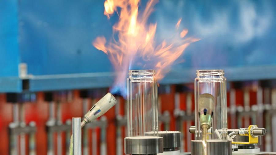 NANTONG, CHINA - JULY 12: Glassware is under firing process at a workshop on July 12, 2022 in Nantong, Jiangsu Province of China. (Photo by VCG/VCG via Getty Images)