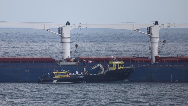 The Joint Coordination Centre officials board Sierra Leone-flagged cargo ship Razoni, carrying Ukrainian grain, for an inspection in the Black Sea off Kilyos, near Istanbul, Turkey August 3, 2022. REUTERS/Umit Bektas