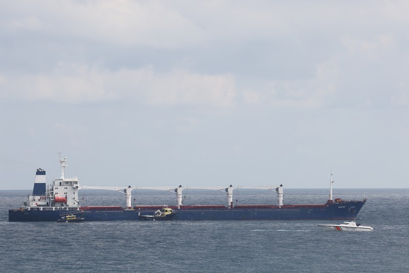 The Joint Coordination Centre officials board Sierra Leone-flagged cargo ship Razoni, carrying Ukrainian grain, for an inspection in the Black Sea off Kilyos, near Istanbul, Turkey August 3, 2022. REUTERS/Umit Bektas