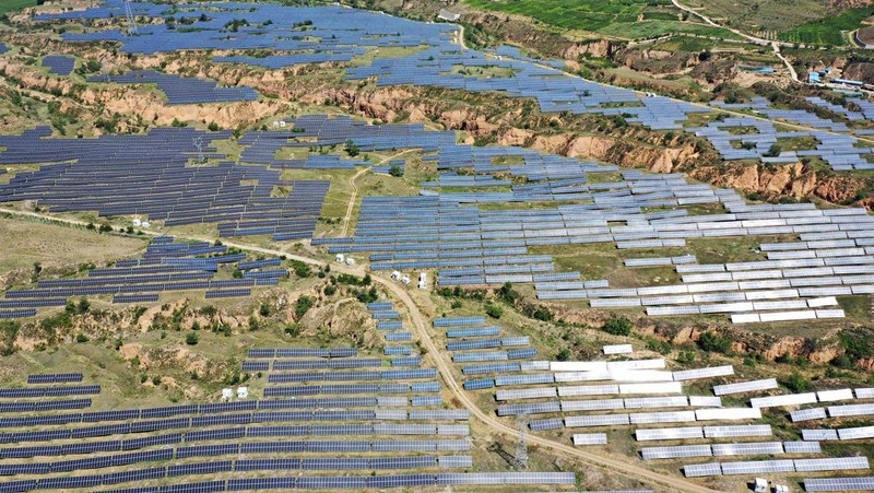 ZHANGJIAKOU, CHINA - AUGUST 6, 2022 - An aerial photo shows a photovoltaic power station on barren mountain in Zhangjiakou, Hebei province, Aug 6, 2022. (Photo credit should read CFOTO/Future Publishing via Getty Images)
