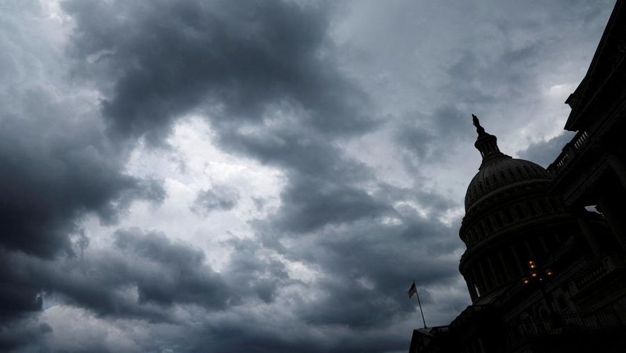 FILE PHOTO: Storm clouds pass over the U.S. Capitol in Washington, U.S. July 18, 2022. REUTERS/Jonathan Ernst/File Photo