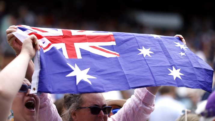 The Australian flag being flown by spectators during the women's quarter final match between Ajla Tomljanovic and Elena Rybakina on court 1 on day ten of the 2022 Wimbledon Championships at the All England Lawn Tennis and Croquet Club, Wimbledon. Picture date: Wednesday July 6, 2022. (Photo by Steven Paston/PA Images via Getty Images)