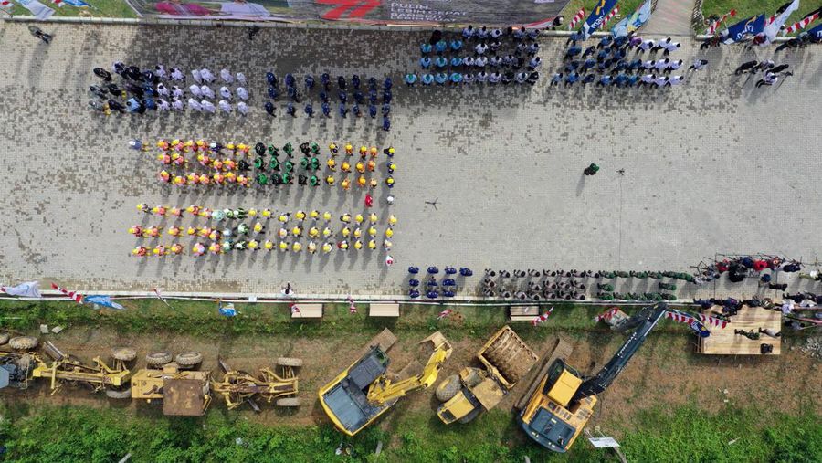 An aerial picture shows a flag-raising ceremony at ground zero of Indonesia's future capital in Sepaku, Penajam Paser Utara, East Kalimantan on August 17, 2022, on the country's 77th Independence Day. (Photo by ADEK BERRY / AFP) (Photo by ADEK BERRY/AFP via Getty Images)