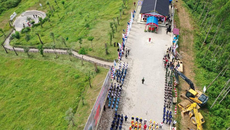 An aerial picture shows a flag-raising ceremony at ground zero of Indonesia's future capital in Sepaku, Penajam Paser Utara, East Kalimantan on August 17, 2022, on the country's 77th Independence Day. (Photo by ADEK BERRY / AFP) (Photo by ADEK BERRY/AFP via Getty Images)