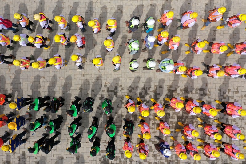 An aerial picture shows a flag-raising ceremony at ground zero of Indonesia's future capital in Sepaku, Penajam Paser Utara, East Kalimantan on August 17, 2022, on the country's 77th Independence Day. (Photo by ADEK BERRY / AFP) (Photo by ADEK BERRY/AFP via Getty Images)