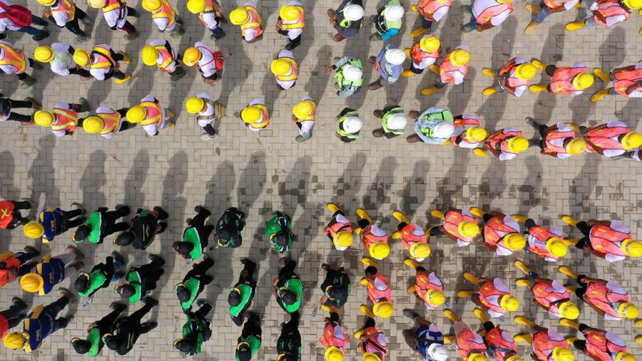 An aerial picture shows a flag-raising ceremony at ground zero of Indonesia's future capital in Sepaku, Penajam Paser Utara, East Kalimantan on August 17, 2022, on the country's 77th Independence Day. (Photo by ADEK BERRY / AFP) (Photo by ADEK BERRY/AFP via Getty Images)