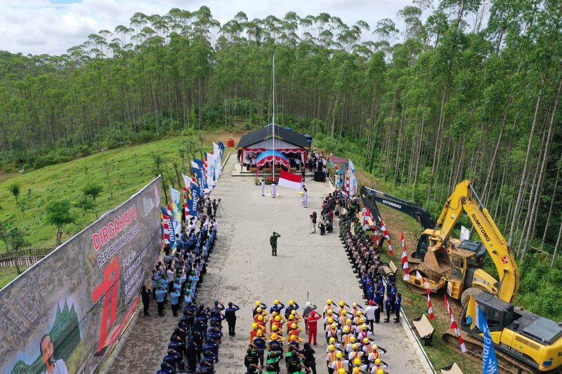 An aerial picture shows a flag-raising ceremony at ground zero of Indonesia's future capital in Sepaku, Penajam Paser Utara, East Kalimantan on August 17, 2022, on the country's 77th Independence Day. (Photo by ADEK BERRY / AFP) (Photo by ADEK BERRY/AFP via Getty Images)