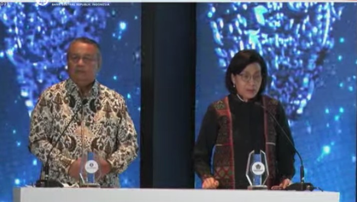 Gubernur Bank Indonesia, Perry Warjiyo dan Menteri Keuangan Sri Mulyani Saat Peluncuran Uang Rupiah Kertas Tahun Emisi 2022 Gubernur Bank Indonesia, Perry Warjiyo dan Menteri Keuangan Sri Mulyani Saat Peluncuran Uang Rupiah Kertas Tahun Emisi 2022, Kamis (18/8/2022). (Tangkapan Layar Youtube BI)