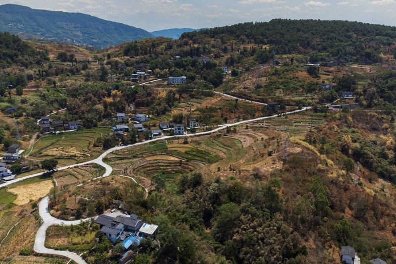 CHINA-WEATHER/FARMER An aerial view of parched terrace fields in Fuyuan village, as the region is experiencing a drought, in Chongqing China, August 19, 2022. REUTERS/Thomas Peter TPX IMAGES OF THE DAY