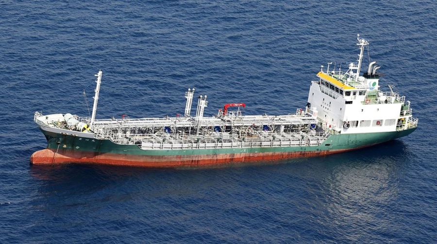 This aerial photo shows Japanese chemical tanker Ryoshinmaru after a collision, off Kushimoto, Wakayama prefecture, southwestern Japan, Saturday, Aug. 20, 2022. The Japanese chemical tanker ship crashed into a cargo ship off the coast of southwestern Japan, the coast guard said Saturday.(Kyodo News via AP)