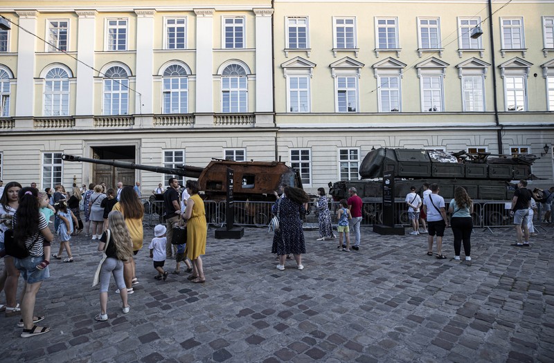 LVIV, UKRAINE - AUGUST 20: People visit the Russian equipment destroyed by the Armed Forces of Ukraine at the Market Square as the Russia-Ukraine war continues especially in Donetsk region in the east, in Lviv Oblast, Ukraine on August 20, 2022. (Photo by Metin Aktas/Anadolu Agency via Getty Images)