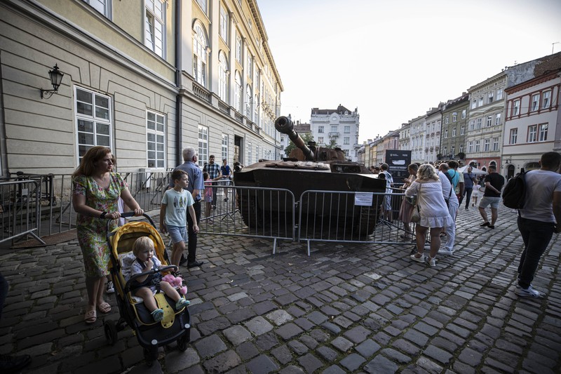 LVIV, UKRAINE - AUGUST 20: People visit the Russian equipment destroyed by the Armed Forces of Ukraine at the Market Square as the Russia-Ukraine war continues especially in Donetsk region in the east, in Lviv Oblast, Ukraine on August 20, 2022. (Photo by Metin Aktas/Anadolu Agency via Getty Images)