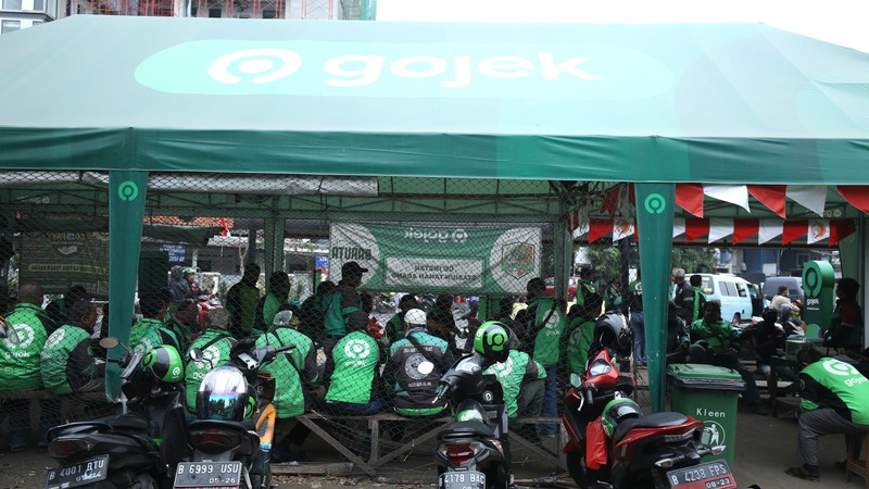 Ilustrasi aturan baru tarif ojek online. (CNBC Indonesia/Tri Susilo) Ilustrasi aturan baru tarif ojek online. (CNBC Indonesia/Tri Susilo)
