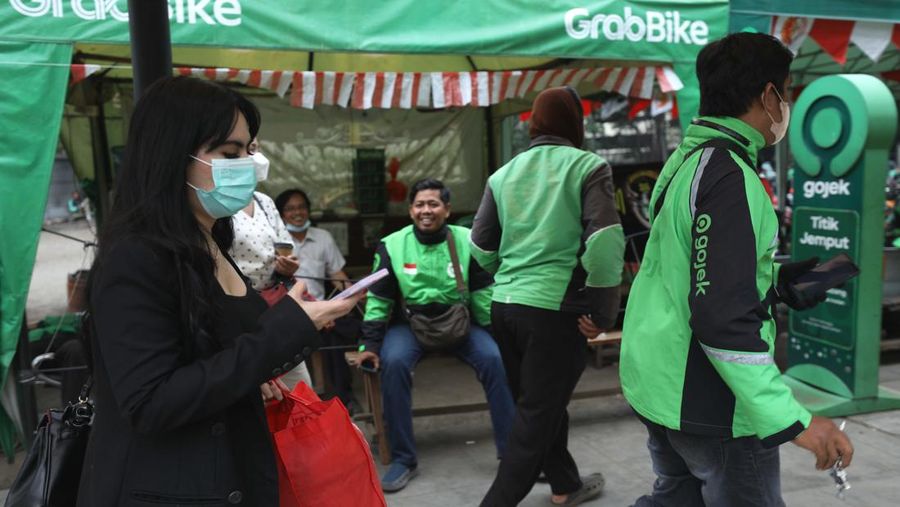 Ilustrasi aturan baru tarif ojek online. (CNBC Indonesia/Tri Susilo)