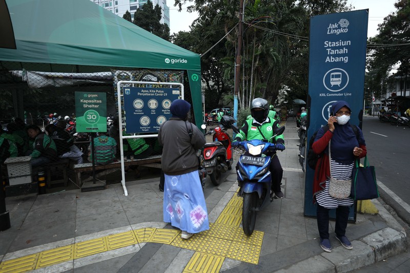 Ilustrasi aturan baru tarif ojek online. (CNBC Indonesia/Tri Susilo)
