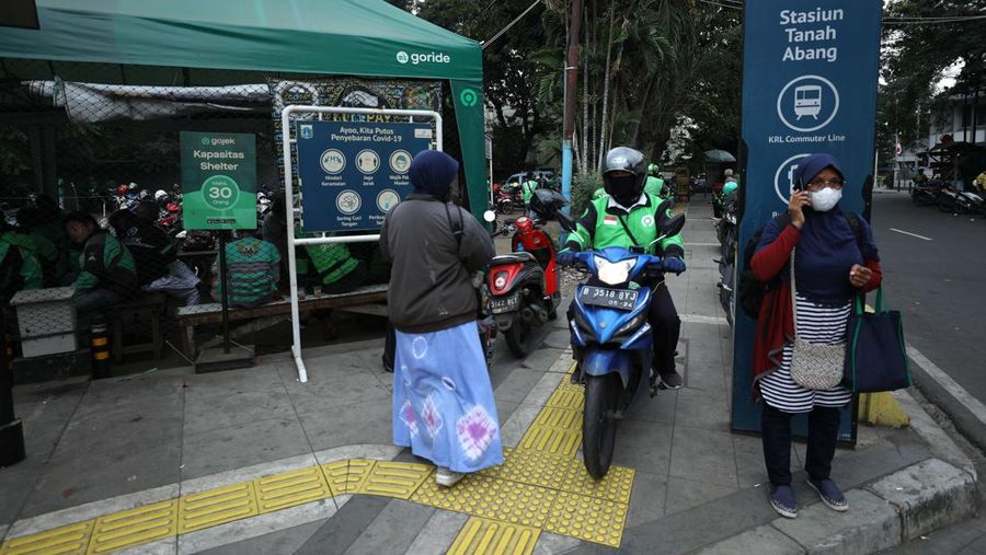 Ilustrasi aturan baru tarif ojek online. (CNBC Indonesia/Tri Susilo)