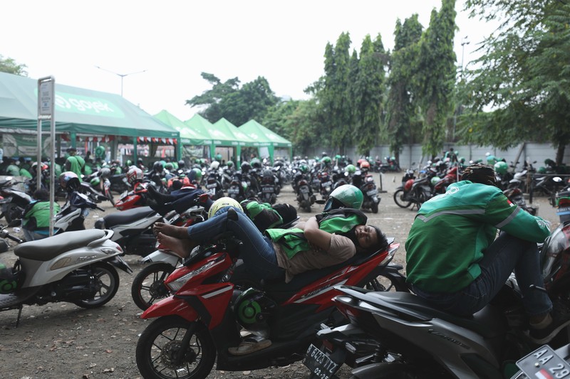 Ilustrasi aturan baru tarif ojek online. (CNBC Indonesia/Tri Susilo)