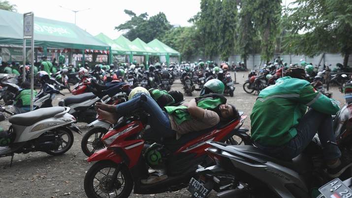 Ilustrasi aturan baru tarif ojek online. (CNBC Indonesia/Tri Susilo) Ilustrasi aturan baru tarif ojek online. (CNBC Indonesia/Tri Susilo)