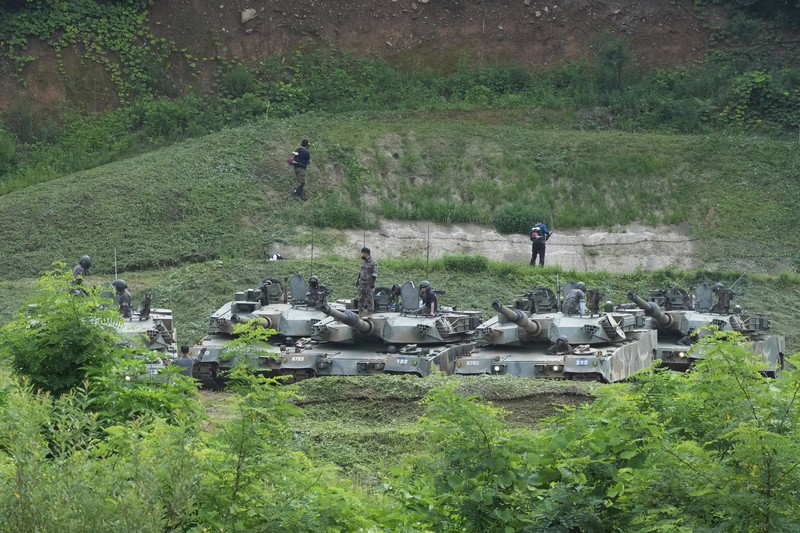 South Korean army K-9 self-propelled howitzers take positions in Paju, near the border with North Korea, South Korea, Monday, Aug. 22, 2022. The United States and South Korea began their biggest combined military training in years Monday as they heighten their defense posture against the growing North Korean nuclear threat. (AP Photo/Ahn Young-joon)