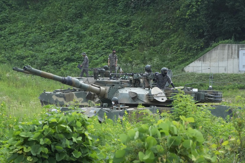 South Korean army K-9 self-propelled howitzers take positions in Paju, near the border with North Korea, South Korea, Monday, Aug. 22, 2022. The United States and South Korea began their biggest combined military training in years Monday as they heighten their defense posture against the growing North Korean nuclear threat. (AP Photo/Ahn Young-joon)