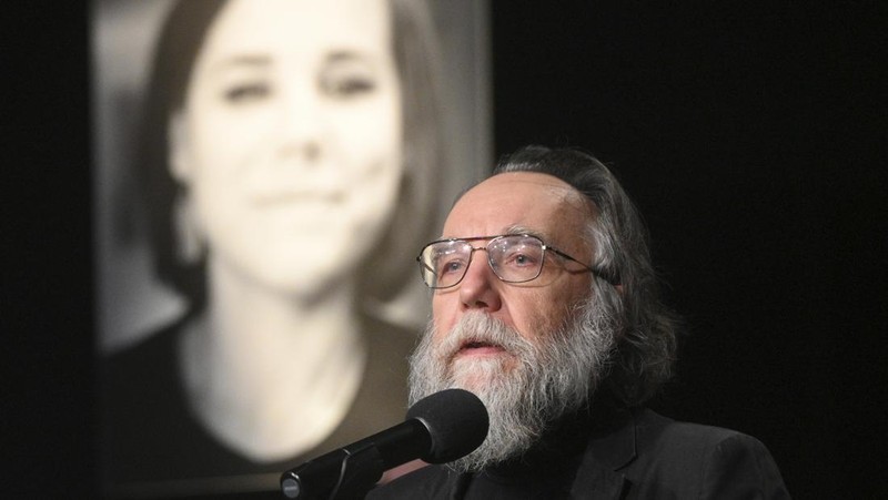 Philosopher Alexander Dugin speaks during the final farewell ceremony for his daughter Daria Dugina in Moscow, Russia, Tuesday, Aug. 23, 2022. Daria Dugina, a 29-year-old commentator with a nationalist Russian TV channel, died when a remotely controlled explosive device planted in her SUV blew up on Saturday night as she was driving on the outskirts of Moscow, ripping the vehicle apart and killing her on the spot, authorities said. (AP Photo/Dmitry Serebryakov)