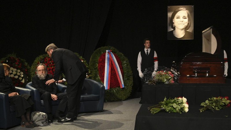 Philosopher Alexander Dugin speaks during the final farewell ceremony for his daughter Daria Dugina in Moscow, Russia, Tuesday, Aug. 23, 2022. Daria Dugina, a 29-year-old commentator with a nationalist Russian TV channel, died when a remotely controlled explosive device planted in her SUV blew up on Saturday night as she was driving on the outskirts of Moscow, ripping the vehicle apart and killing her on the spot, authorities said. (AP Photo/Dmitry Serebryakov)