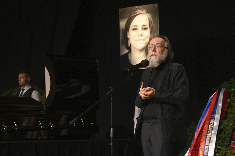 Russia Nationalist Killed Philosopher Alexander Dugin speaks during the final farewell ceremony for his daughter Daria Dugina in Moscow, Russia, Tuesday, Aug. 23, 2022. Daria Dugina, a 29-year-old commentator with a nationalist Russian TV channel, died when a remotely controlled explosive device planted in her SUV blew up on Saturday night as she was driving on the outskirts of Moscow, ripping the vehicle apart and killing her on the spot, authorities said. (AP Photo/Dmitry Serebryakov)