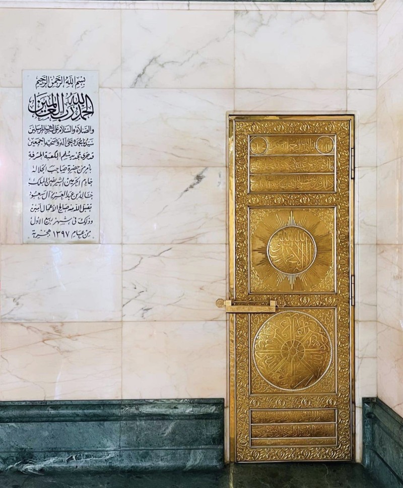 1241744336 This picture taken on July 6, 2022 shows a close-up view of the Kiswa, the cloth used to cover the Kaaba, and the Kaaba's gold doors underneath, at the Grand Mosque in the Muslim holy city of Mecca during the annual Hajj pilgrimage. - One million fully vaccinated Muslims, including 850,000 from abroad, are allowed at this year's hajj in the city of Mecca, a big rise after two years of drastically curtailed numbers due to policies to stop the spread of infection. (Photo by AFP) (Photo by -/AFP via Getty Images)