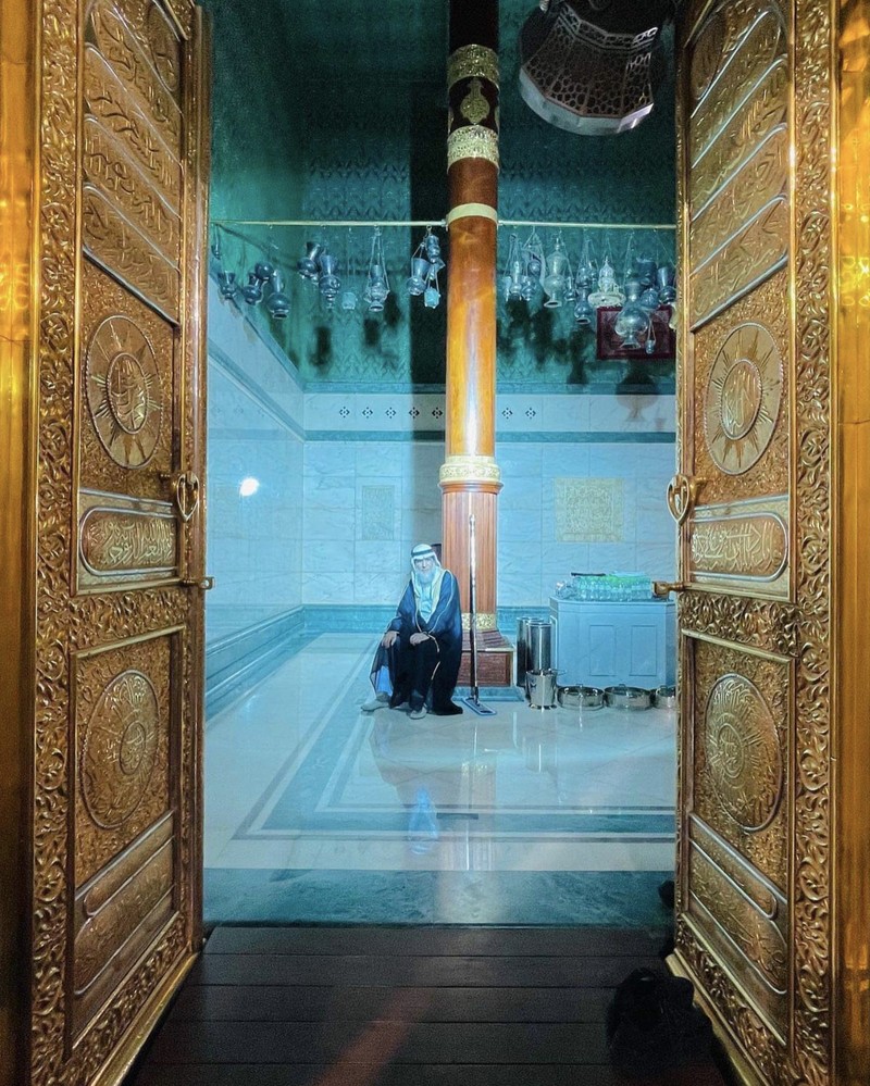 This picture taken on July 6, 2022 shows a close-up view of the Kiswa, the cloth used to cover the Kaaba, and the Kaaba's gold doors underneath, at the Grand Mosque in the Muslim holy city of Mecca during the annual Hajj pilgrimage. - One million fully vaccinated Muslims, including 850,000 from abroad, are allowed at this year's hajj in the city of Mecca, a big rise after two years of drastically curtailed numbers due to policies to stop the spread of infection. (Photo by AFP) (Photo by -/AFP via Getty Images)