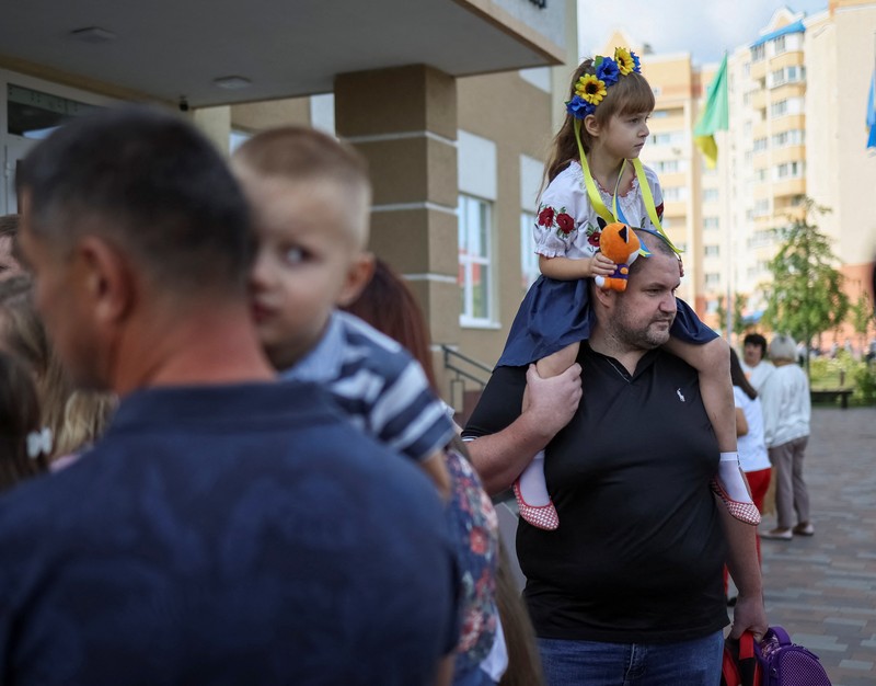 Ukraine's President Volodymyr Zelenskiy attends a ceremony to mark the start of the school year, amid Russia's invasion of Ukraine, in Irpin, in Kyiv region, Ukraine September 1, 2022. Ukrainian Presidential Press Service/Handout via REUTERS ATTENTION EDITORS - THIS IMAGE HAS BEEN SUPPLIED BY A THIRD PARTY.