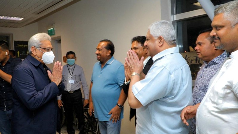 Sri Lanka's ousted President Gotabaya Rajapaksa's party members welcome him and his wife Ioma Rajapaksa at the Bandaranaike International Airport as he returns to the country after he had fled during the July economic unrest and protestors stormed in the president's house in Katunayake, Sri Lanka, September 2, 2022. PR Media Unit/Handout via Reuters NO RESALES. NO ARCHIVES THIS IMAGE HAS BEEN SUPPLIED BY A THIRD PARTY.