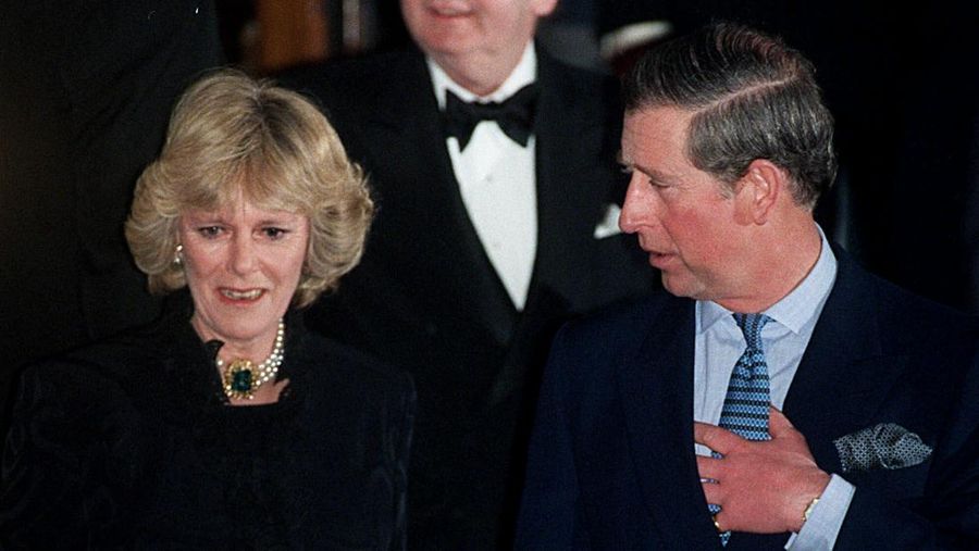 FILE - In this Thursday, Jan. 28, 1999 file photo, Britain's Prince Charles and his companion Camilla Parker Bowles leave the Ritz Hotel in London, the first time that the couple, who have been friends for more than 25 years, have appeared together in public. Prince Charles has been preparing for the crown his entire life. Now, that moment has finally arrived. Charles, the oldest person to ever assume the British throne, became king on Thursday Sept. 8, 2022, following the death of his mother, Queen Elizabeth II. (AP Photo/Alastair Grant, File)