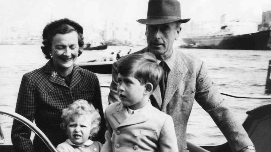 FILE - In this April 10, 1949 file photo, Prince Charles of Edinburgh, left, sits for a photo with his mother, Princess Elizabeth, in Buckingham Palace, London. Prince Charles has been preparing for the crown his entire life. Now, that moment has finally arrived. Charles, the oldest person to ever assume the British throne, became king on Thursday Sept. 8, 2022, following the death of his mother, Queen Elizabeth II. (AP Photo, File)
