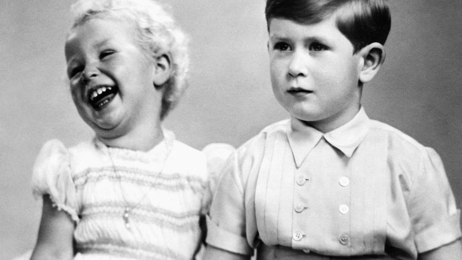 FILE - In this April 10, 1949 file photo, Prince Charles of Edinburgh, left, sits for a photo with his mother, Princess Elizabeth, in Buckingham Palace, London. Prince Charles has been preparing for the crown his entire life. Now, that moment has finally arrived. Charles, the oldest person to ever assume the British throne, became king on Thursday Sept. 8, 2022, following the death of his mother, Queen Elizabeth II. (AP Photo, File)