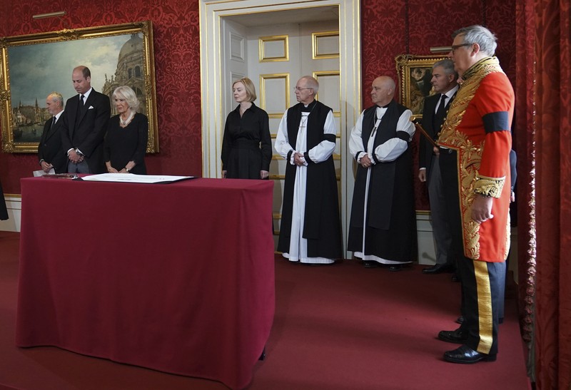 Britain Royals From left, Britain's Prince William, Camilla, the Queen Consort, King Charles III and Lord President of the Council Penny Mordaunt, before Privy Council members in the Throne Room during the Accession Council at St James's Palace, London, Saturday, Sept. 10, 2022, where King Charles III is formally proclaimed monarch. (Jonathan Brady/Pool Photo via AP)
