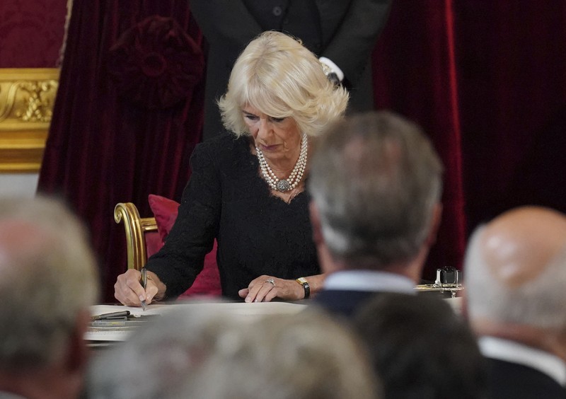 From left, Britain's Prince William, Camilla, the Queen Consort, King Charles III and Lord President of the Council Penny Mordaunt, before Privy Council members in the Throne Room during the Accession Council at St James's Palace, London, Saturday, Sept. 10, 2022, where King Charles III is formally proclaimed monarch. (Jonathan Brady/Pool Photo via AP)