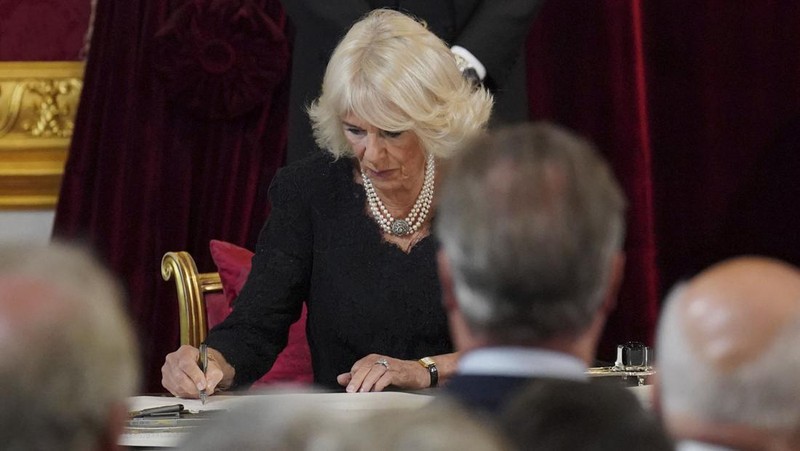 From left, Britain's Prince William, Camilla, the Queen Consort, King Charles III and Lord President of the Council Penny Mordaunt, before Privy Council members in the Throne Room during the Accession Council at St James's Palace, London, Saturday, Sept. 10, 2022, where King Charles III is formally proclaimed monarch. (Jonathan Brady/Pool Photo via AP)